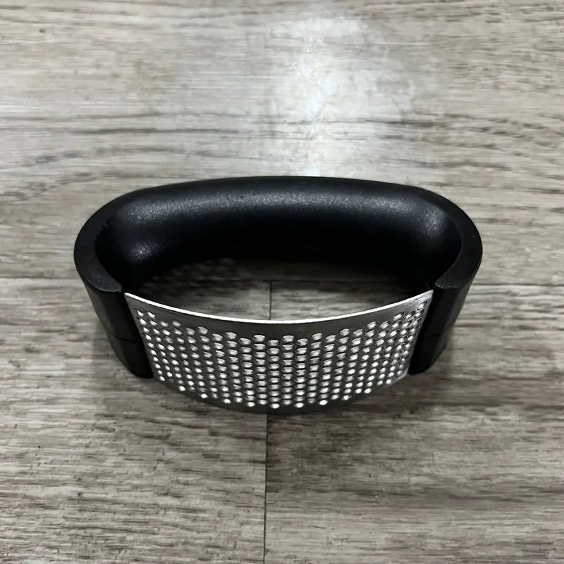 GarlicGlide - Smooth Handheld Press for Garlic and Ginger